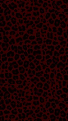 an animal print pattern in red and black