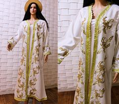 Elevate your style with our exquisite white vintage Moroccan kaftan, adorned with delicate floral embroidery. This classic piece is complemented by a stunning white vintage cape, creating a timeless and elegant combination. Whether you're preparing for a special occasion or just want to infuse your wardrobe with Moroccan charm, this ensemble captures the essence of tradition and sophistication. Be the epitome of grace and style in this unique and versatile outfit, perfect for any event or everyday elegance. measurements  bust : 106cm/41'' length:130/51'' would fit S and M Traditional Summer Wedding Kaftan, Summer White Kaftan With Intricate Embroidery, White Intricately Embroidered Festive Kaftan, Summer Wedding Kaftan With Floral Embroidery, Traditional Summer Wedding Abaya, Festive White Intricately Embroidered Kaftan, Summer Wedding Floral Embroidered Kaftan, Traditional White Kaftan For Spring, Elegant Spring Kaftan With Chikankari Embroidery