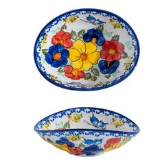 two bowls with flowers painted on them