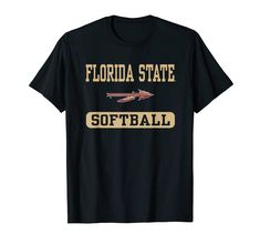 a black shirt with the words florida state softball in gold letters and an arrow on it