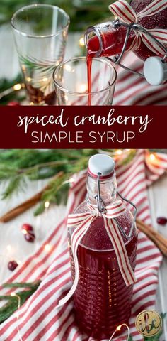 a bottle of homemade cranberry syrup is being drizzled with red liquid