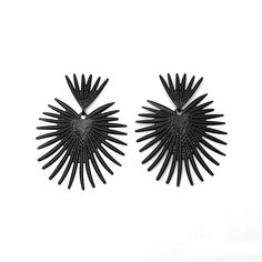 Make a bold statement with these ARI Statement Earrings! Featuring an eye-catching design, these earrings will add pizzazz to any outfit. Whether you're headed for a night out on the town or a casual walk in the park, these earrings are the perfect accessory for any occasion! Black Hoop Earrings For Summer Gift, Modern Black Jewelry For Summer, Summer Party Pierced Earrings, Modern Black Summer Jewelry, Trendy Black Clip-on Earrings, Black Drop Earrings For Summer, Bold Black Drop Earrings, Black Party Earrings For Summer, Black Dangle Earrings For Summer