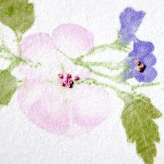 an image of flowers painted on fabric