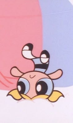 an image of a cartoon bird with big eyes on it's face and head