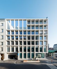 a large white building with lots of windows