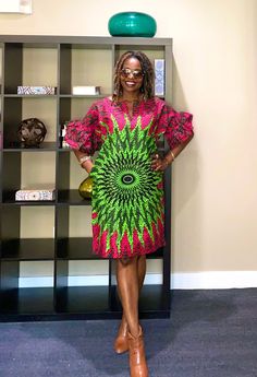 Bright and happy African dress!  Our lovely African print dress has a split neck, 2 side pockets, and an all-around flattering look for every size. XS-Plus sizes. Length-37" Model is 5'7" This dress will be hand crafted for you upon purchase.  *️⃣ FEATURES 🔸Beautiful peplum sleeves 🔸Split neck design 🔸Loose fit Colors: Pink and green  MEASUREMENT GUIDE:  We appreciate you including your bust and hip measurements if not we will use the measurements listed with the size selected. US "2" /UK "6" XXS Bust:31 Hips: 34 US "4"/ UK "8" XS - Bust:32 Hips: 36 US "6"/ UK "10" S - Bust:34 Hips: 38 US "8"/ UK "12" M - Bust:36 Hips: 40 US "10"/ UK "14" L- Bust: 38 Hip: 42 Other sizes sold out 📦 SHIPPING 🔸Processing the order- 1-7 days 🔸USPS First Class - 2-5 days 🔸Expedited shipping available at Printed Green Knee-length Mini Dress, Green Printed Knee-length Dress, Green Shift Midi Dress, Summer Dresses Green, Peplum Sleeves, Style Vert, Dress Stores, Peplum Gown, Pink Casual Dress