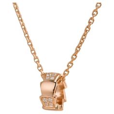 SKU AT-2138 Comes With Full Set (Box + Card) Date 2018 RRP £5,600 Incl Taxes/€6,500 Incl Taxes / $5,900.00 Excl Taxes Model Serpenti Serial Number M4**** Metal 18k Rose Gold Stones Diamond Weight 11.5 g Length 42 cm ____________________________________________________________________ Condition: Excellent ____________________________________________________________________ If you are interested in any of our previously sold pieces, please contact us and we will do our best to source another one. Bulgari Serpenti, Box Card, Rose Gold Necklace, 18k Rose Gold, Full Set, Or Rose, Jewelry Necklace Pendant, Gold Necklace, Jewelry Necklaces