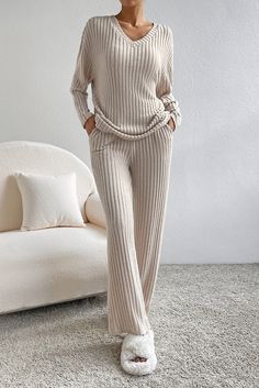 Ribbed knit for a cozy and textured look Chic V-neck design adds a touch of elegance Slouchy fit for a relaxed and comfortable feel Two-piece outfit for versatile styling options Size Chart (CM) Sizes Bust Waist Hem_Width Shoulder Sleeve_Length Length Hip Bottoms Inseam Outseam Relax Relax Relax Relax Relax Relax Relax Relax Relax Relax S 108 67 102 65 46 63.5 96 56.5 74.8 105 M 114 72 108 68 46.5 65.5 102 60 75 106 L 120 77 114 71 47 67.5 108 63.5 75.2 107 XL 128 84 122 75 47 69.5 116 68 75.2 1 Traje Casual, Top And Pants Set, Casual Stylish, Loose Pants, Look Casual, Lounge Sets, Two Piece Outfit, Look Chic