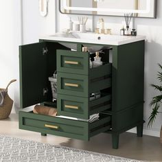 a bathroom vanity with drawers and a sink