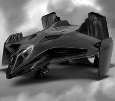 the futuristic vehicle is flying through the sky with clouds in the backgrouund