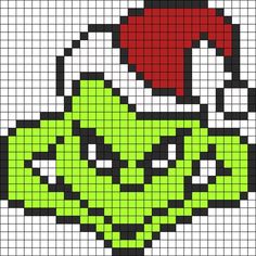 the grin face is shown on this pixellated pattern, and it looks like he's wearing a santa hat