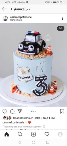 the cake is decorated with cars on it