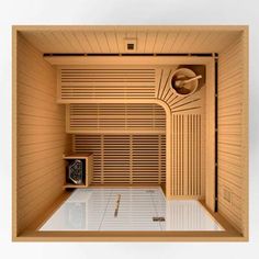 the inside of a wooden sauna with two clocks on each side