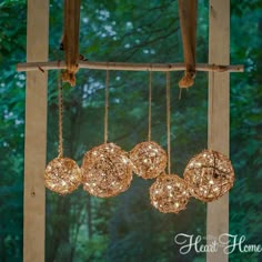 an outdoor chandelier made out of old wire balls