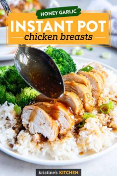 a white plate topped with chicken and broccoli covered in gravy on top of rice