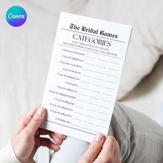 a person holding up a paper with the bridal games on it