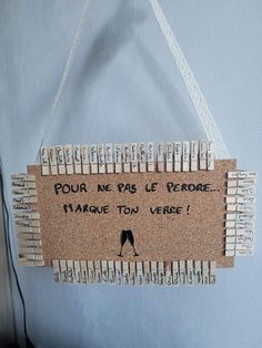 a bulletin board with clothes pins attached to it that says, pour me pass le perce harquet town verre