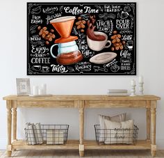 a coffee shop sign hanging on the wall above a wooden table