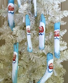 some toothbrushes are hanging from a christmas tree