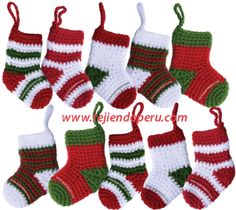 crocheted christmas stockings with green and red stripes