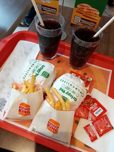 fries and drinks on a tray at a fast food restaurant