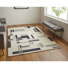 a living room scene with focus on the rug