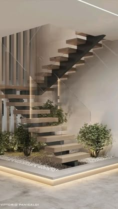 a modern staircase with plants in the middle