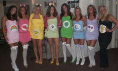 a group of women dressed up in costumes