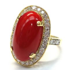 18k Yellow Gold Cabochon Cut Red Coral 12mm x 23mm Surrounded by 2,18 Carat in Diamonds Filigree RingThis is a very unique Ring, with a Genuine Red Coral in Cabochon Shape 12 mm x 23 mm, the diamonds are H color and VS clarity (total of 2.18 ct). The gold is designed with precious filigree..https://www.youtube.com/watch?v=cgsgLlpil4k&feature=youtu.beTOTAL WEIGHT: 11.03 dwt/ 17.15 gSIZE: 7.75GOLD: 18k Yellow GoldGEMSTONE: Red Coral, DiamondsCoral: -Color: Red -Cut: Cabochon -12mm x 23mm Diamo Luxury Red Oval Cabochon Jewelry, Red Cabochon 14k Gold Jewelry, Collectible Oval Ruby Ring, Collectible Oval Red Ring, Red Oval Art Deco Jewelry, Luxury Red Cabochon Ruby Ring, Red Oval Art Deco Rings, Art Deco Red Oval Rings, 14k Gold Cabochon Red Ring