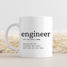 a white coffee mug with the words engineer on it