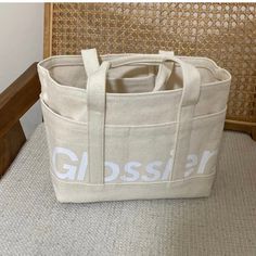 Nwt Brand New, Sealed In Original Packaging. Glossier Brooklyn In Store Exclusive Utility Canvas Tote Bag. A Take-Everywhere, Hold-Everything Tote. At All Of Our Store Locations, Exclusive Merchandise Benefits A Local Community Organization. For A Limited Time, We're Bringing These Glossier Goods-And Their Positive Impact-Online. Our Glossier Brooklyn Canvas Tote Is A Sturdy, Strapped Bag Embossed With Our Logo And The Store's Address. It Comes With 8 (!!) Pockets For Maximum Storage And Style. Glossier Utility Bag, Glossier Merch, Glossier Tote Bag, Pinterest Wishlist, Community Organization, Glossier Bag, Utility Tote Bag, Aesthetic Bags, Utility Tote