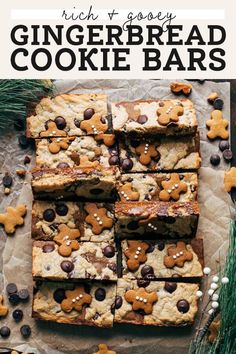 chocolate chip cookie bars are arranged on top of parchment paper with christmas decorations around them