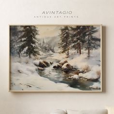 a painting hanging on the wall above a bed in a room with white walls and pillows