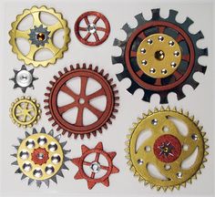 several different types of gears on a white background