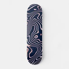 a skateboard with an abstract design on the front and back side, against a white background