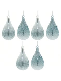 six glass tear shaped ornaments hanging from strings