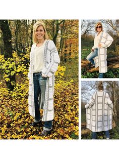 a woman standing in the woods wearing a long cardigan