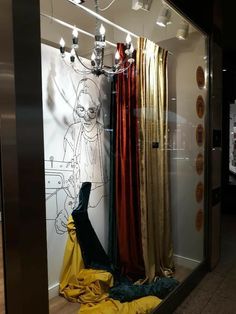 an image of a window display with curtains