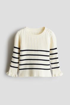 Soft  rib-knit sweater. Ribbed neckline  buttons on one shoulder  and ruffle-trimmed cuffs. Textured Knit Sweater, Girls Jumpers, Sweatshirt Set, Fall 24, Ribbed Knit Sweater, School Shopping, Ribbed Neckline, Beige Sweater, Girls Toddler