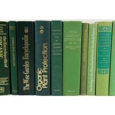 a row of green books sitting on top of each other