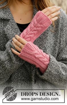 a woman wearing a pink knitted arm warmer with her hands folded over her chest