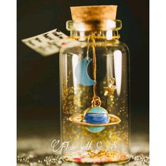 a glass jar filled with an object on top of a table