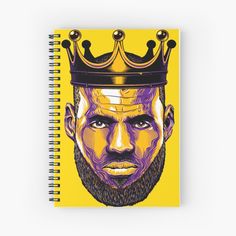 a spiral notebook with a drawing of a bearded man wearing a crown on his head