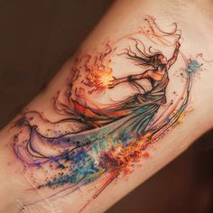 a woman's leg with a colorful tattoo on it and an image of a flame coming out of her body