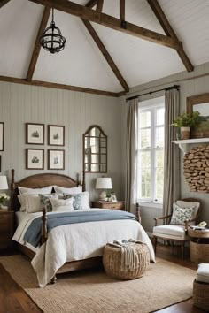 a bedroom with wood floors, white walls and wooden beams on the ceiling is decorated in neutral colors