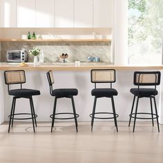 If you are looking for a counter stool, the Zesthouse rattan bar stools counter height is definitely your choice. With an elegant boucle fabric with matte black metal legs, this mid-century modern barstools is a perfect fit for any setting, whether it's a kitchen, dining room, or pub. The all-natural, hand-woven rattan full backrest with a convenient swivel design, making this black bar chairs a brilliant addition to your home, and lending a unique design touch to its appearance. The swivel bar Bar Stools With Black Countertops, Black Counter Height Chairs, Black Bar Chairs, Apartment Kitchen Bar Stools, Black Bar Stools Kitchen Island, Black Bar Stools Kitchen, Kitchen Island Bar Stools, Charleston Apartment, Black Rattan Chair