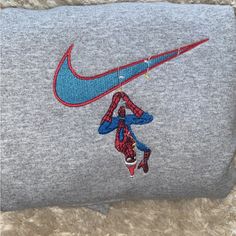 Embroidered On A Gildan Unisex Fit Perfect Christmas Gift Please Allow Us 1 Day Processing Time Sporty Blue Embroidered Sweatshirt, Spider Man Christmas, Sweaters Nike, Christmas Crewneck Sweatshirt, Christmas Crewneck, Nike Sweater, Sweaters Crewneck, Perfect Christmas Gifts, Perfect Christmas