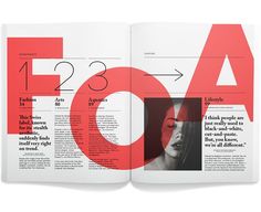 an open magazine with red and black text on the front cover, featuring a woman's face