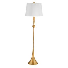 the golden metal floor lamp has a white shade