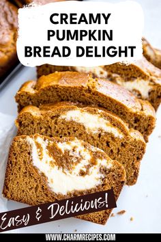 a loaf of pumpkin bread with cream cheese frosting and cinnamon swirls on top